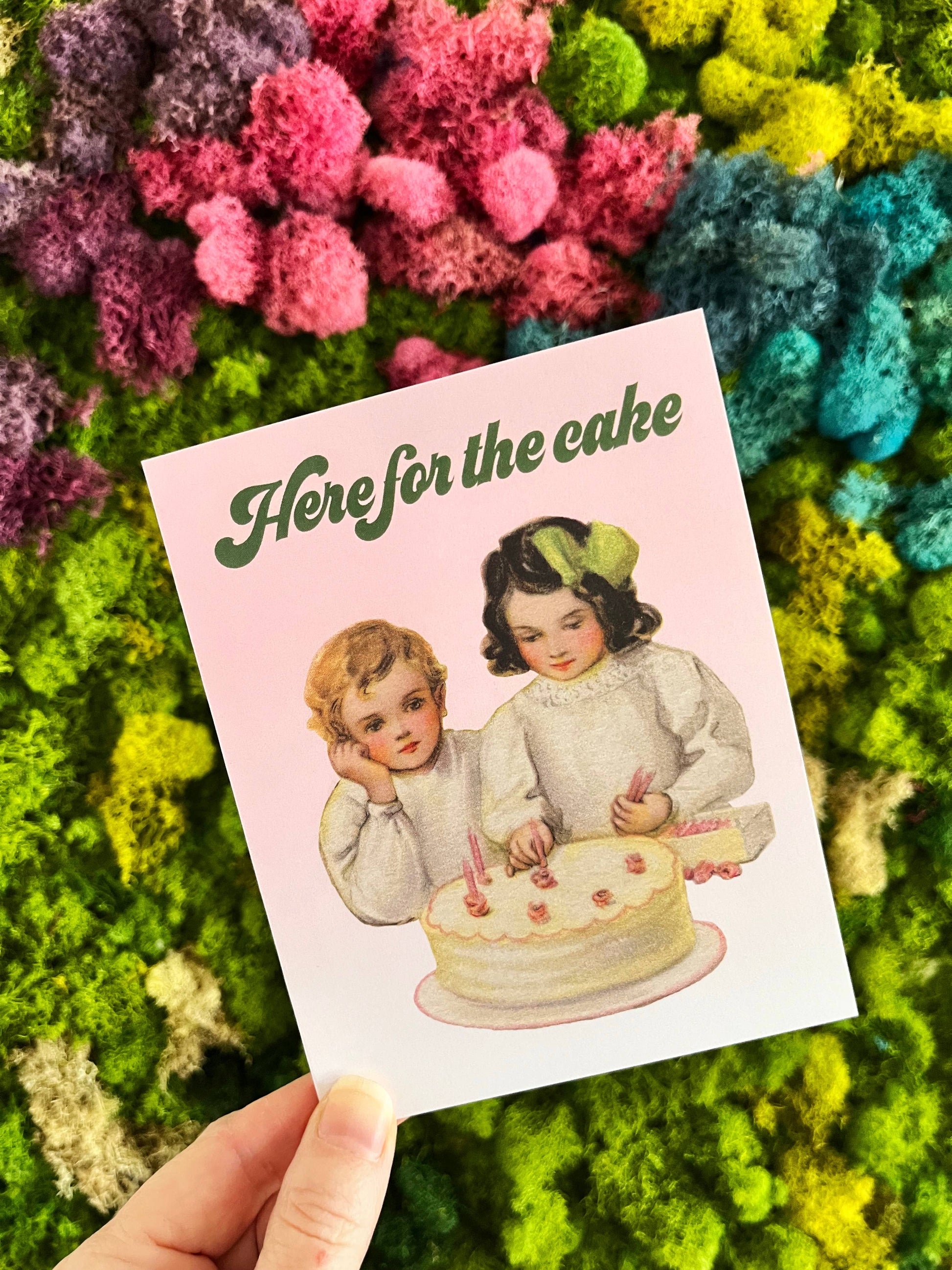 Funny birthday wedding celebration card by The Coin Laundry featuring humorous "Here for the Cake" design with colorful illustrations.