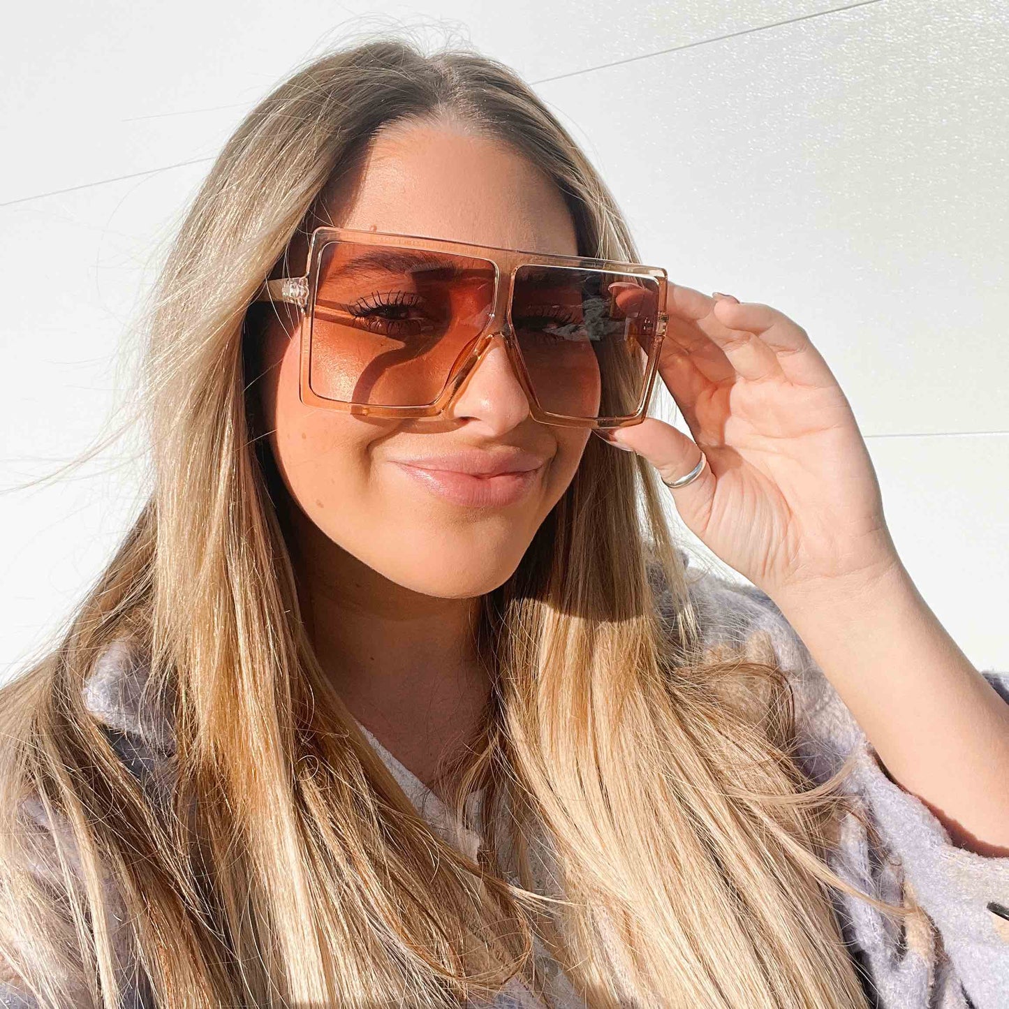 Pretty Simple Beverly oversized sunglasses with dark tinted lenses and thick black frames, stylish and trendy accessory.