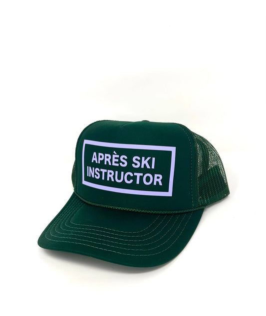Après Babe après ski instructor trucker hat with embroidered design, adjustable snapback, and mesh back for outdoor winter activities.