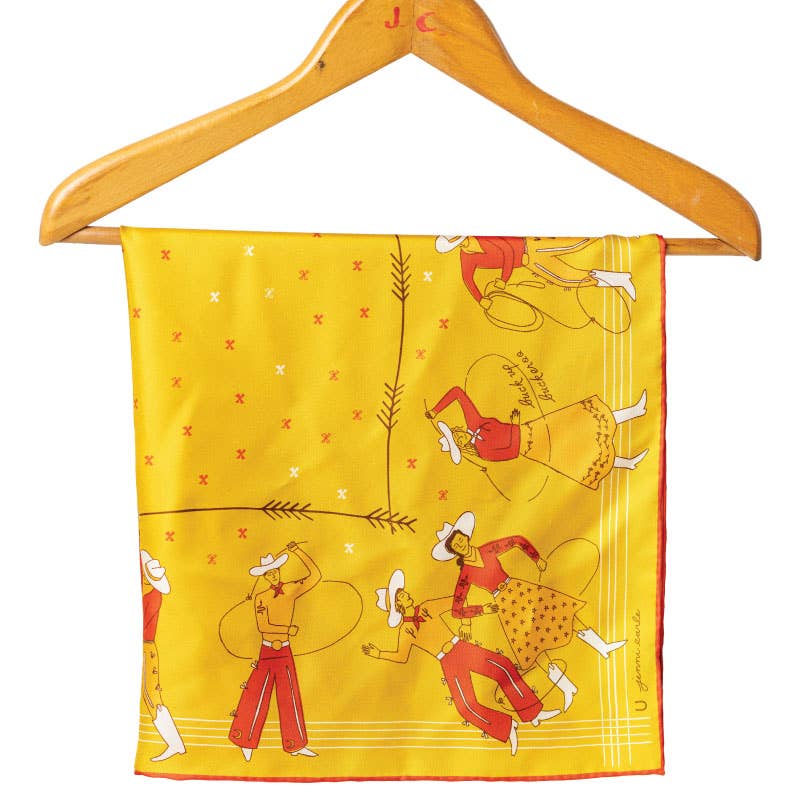 Jenni Earle Buck Up Buckaroo silk bandana scarf with vibrant southwestern pattern, shown flat with detailed fabric design.