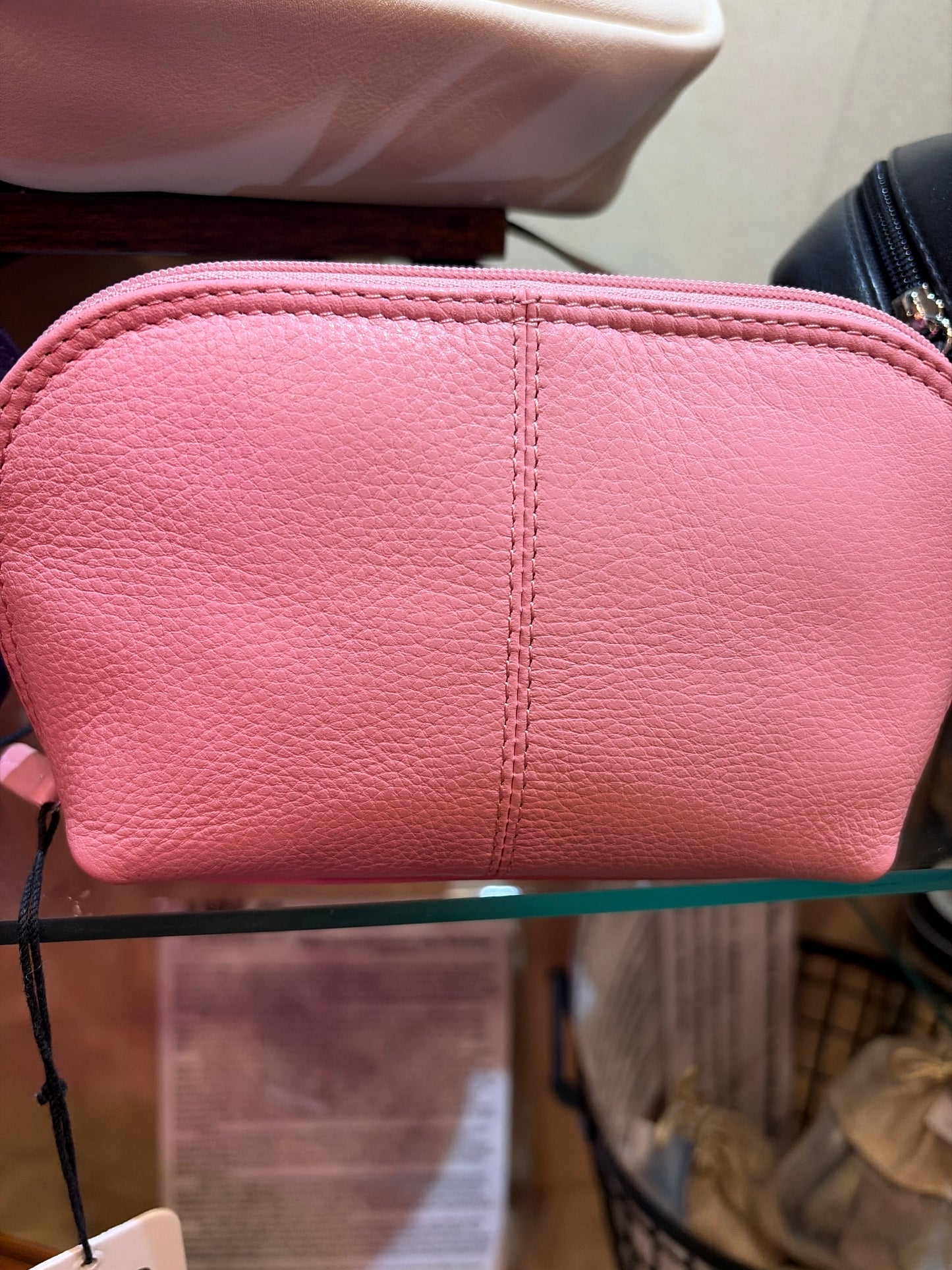 Small ili New York cosmetics case bag with zipper closure, compact and stylish for storing beauty essentials.
