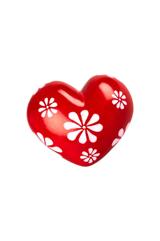 Colorful Share the Love Paperweight from Ten Thousand Villages Delights collection, featuring a decorative design on smooth glass surface.
