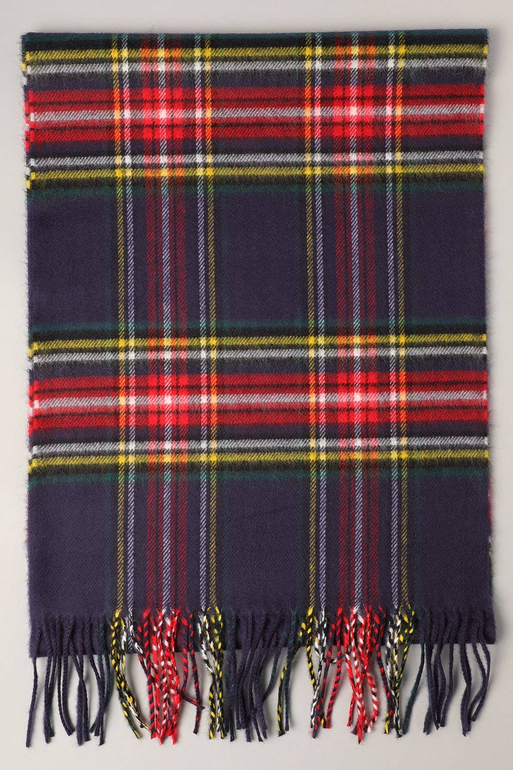 Fashion City tartan plaid muffler scarf draped over a neutral background, showcasing its warm, cozy fabric and classic plaid pattern.