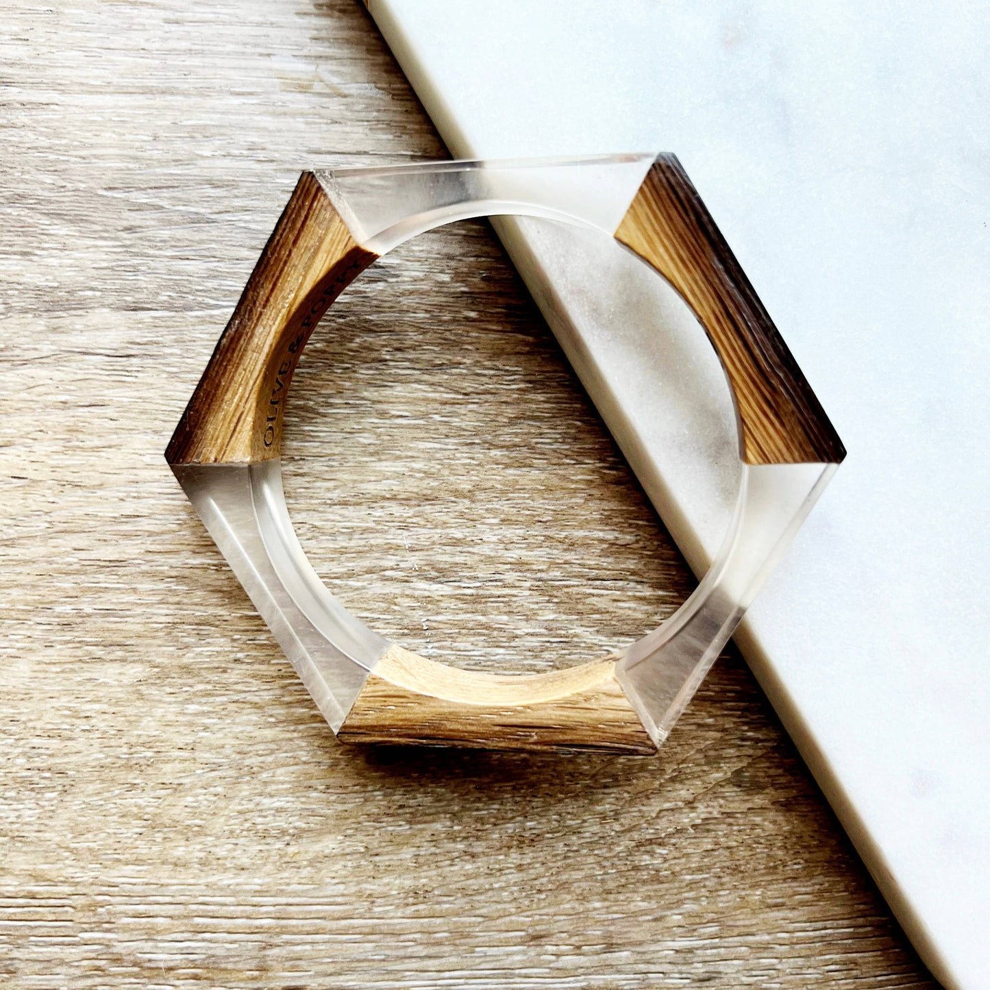 Olive and Poppy 1/2-inch barrel bracelet with textured metal design, showcasing a stylish accessory for everyday wear.