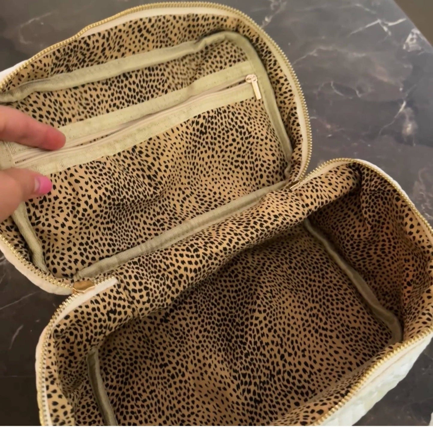 Ellison+Young quilted velvet vanity case with zipper closure, padded interior, and compact design for travel storage.