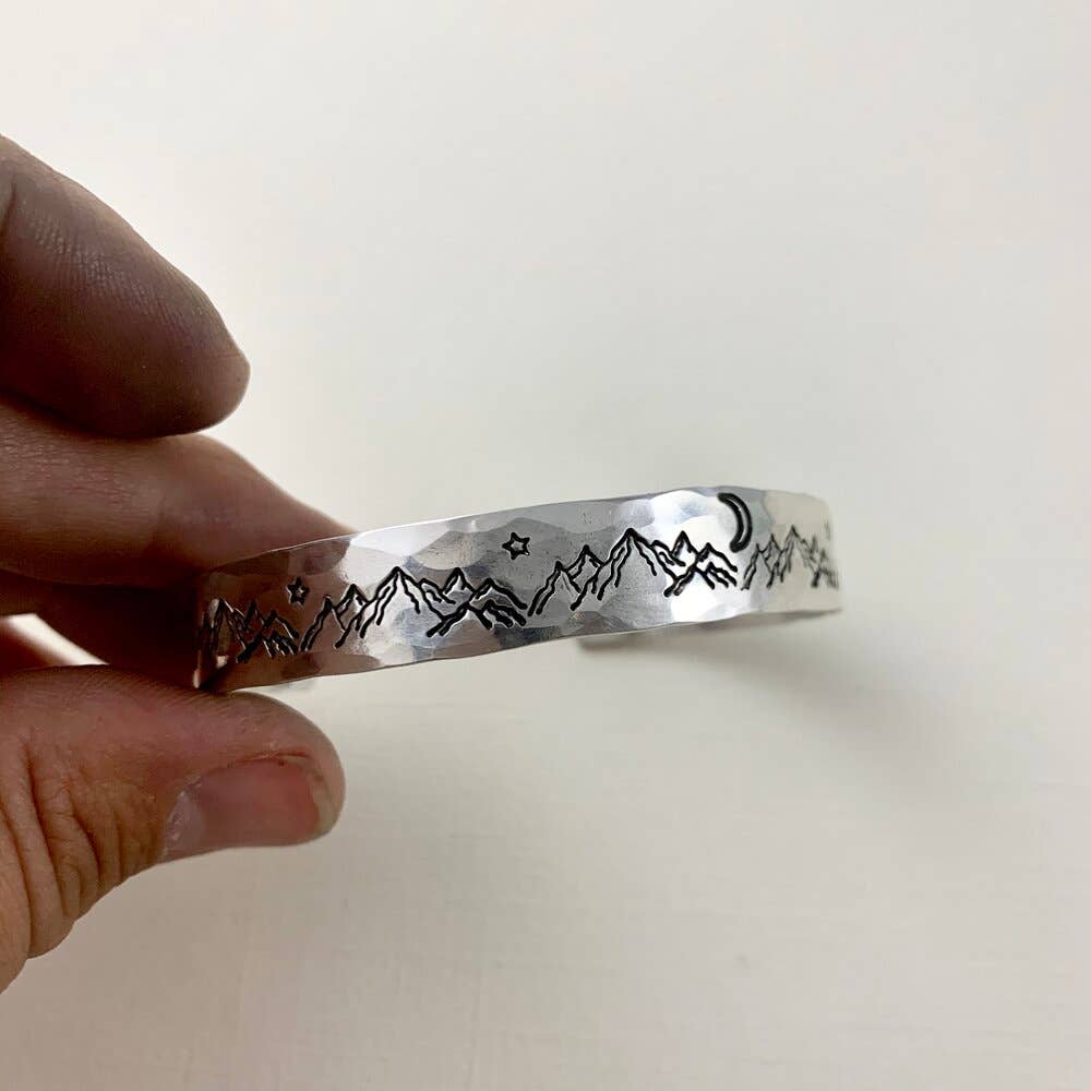 Handmade Mountain High cuff bracelet by Fluff Hardware featuring rugged mountain-inspired design in metal.