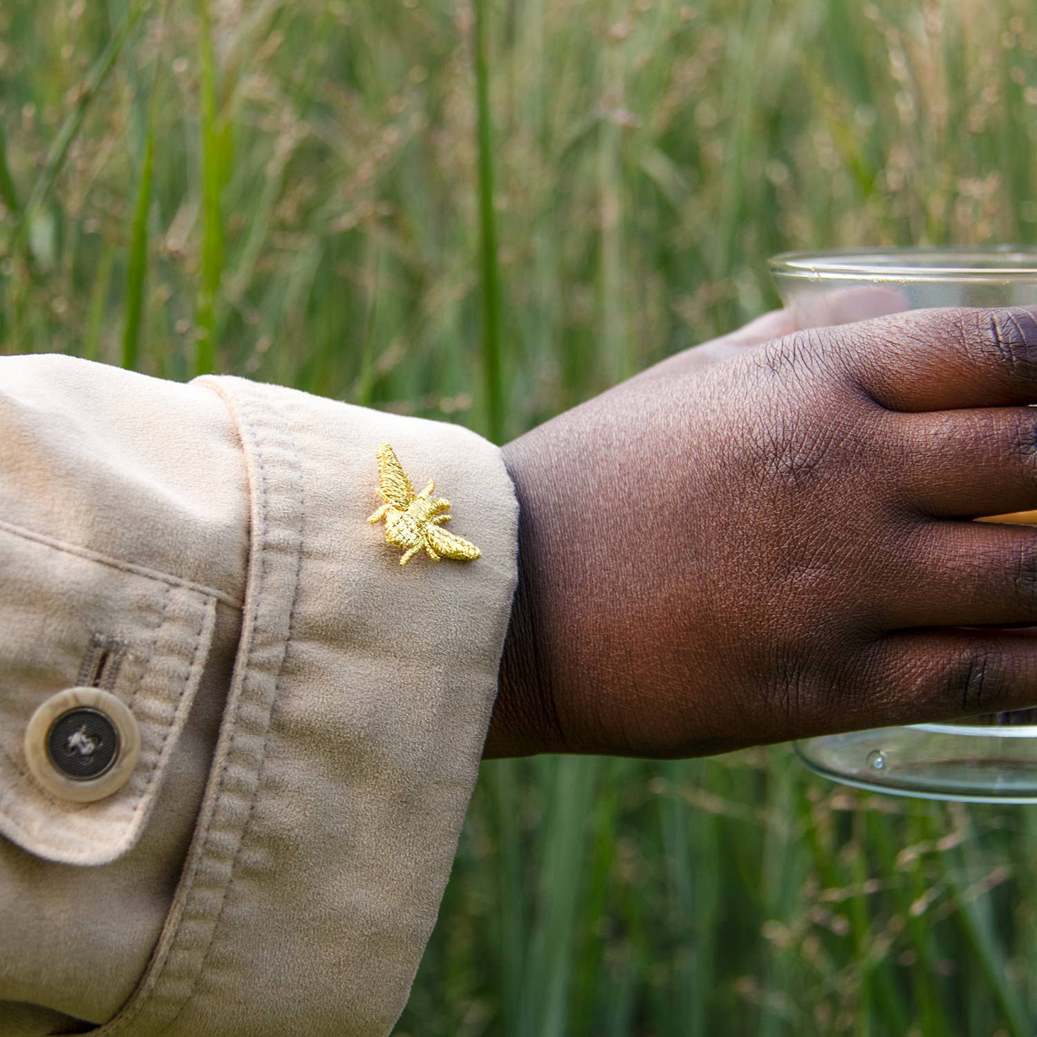 Golden embroidered bug pins by Botanopia USA featuring three small insect-shaped brooches for plant lovers.