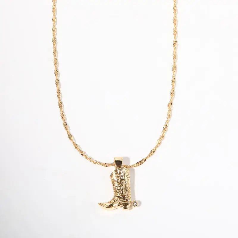18K gold plated cowboy boot with spur pendant necklace from Sweet Cherry Sky, detailed close-up of the jewelry piece.