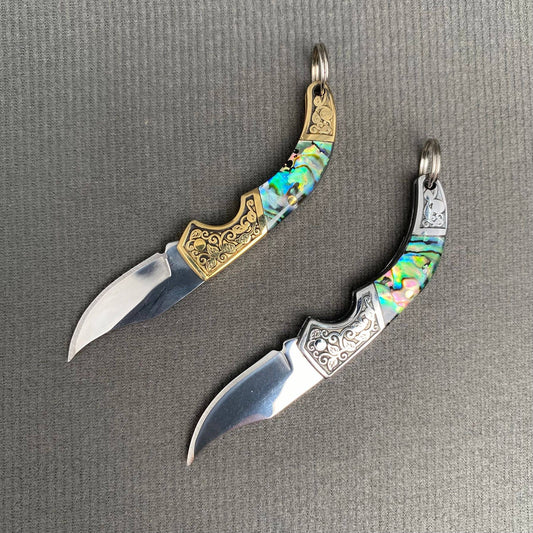 Mio Queena Shell Inlaid Tiny Knife with detailed shell inlay on compact, elegant knife blade and handle.