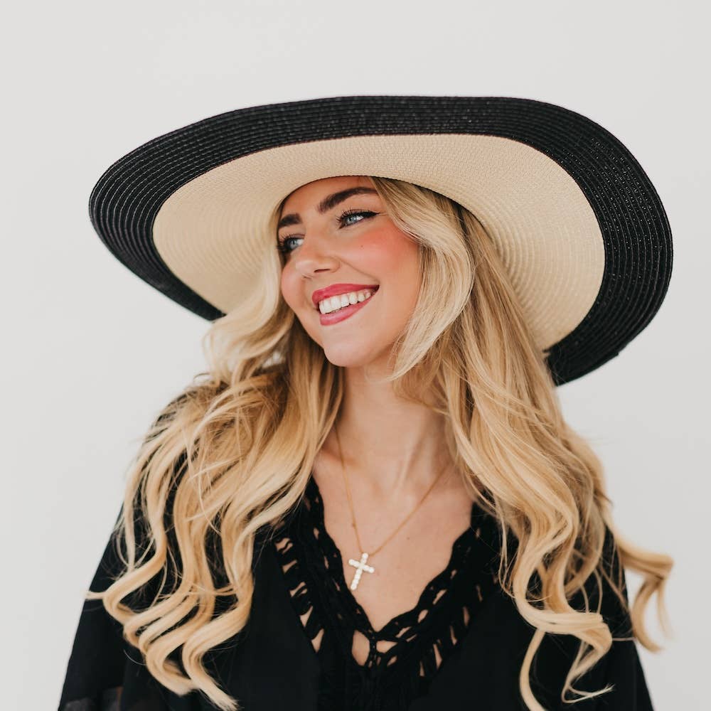 Wide-brimmed Miami Summer Sun Hat by Pretty Simple, lightweight floppy sun hat with a wide brim for sun protection.
