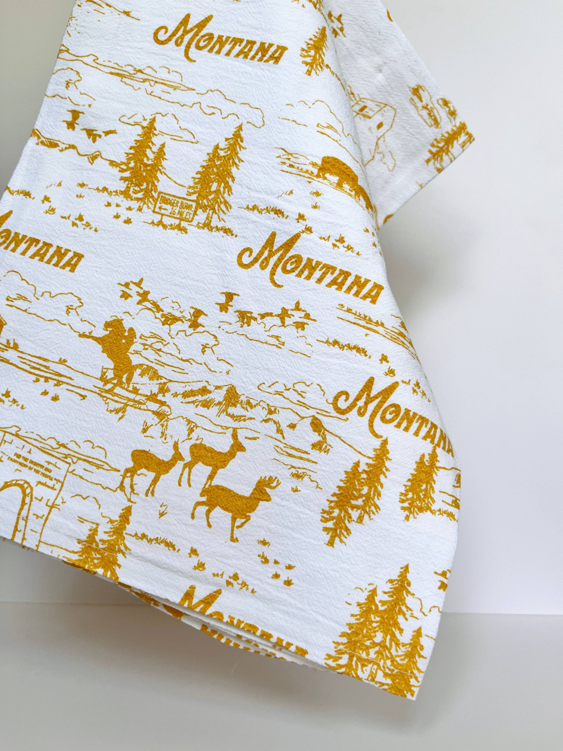 Montana Scenes cotton kitchen towel featuring scenic landscape print, durable and absorbent, by The Coin Laundry.
