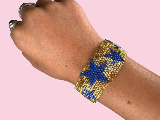 Blue and gold Camel Threads game day adult bracelet with beads and adjustable cord for sports fan accessories.