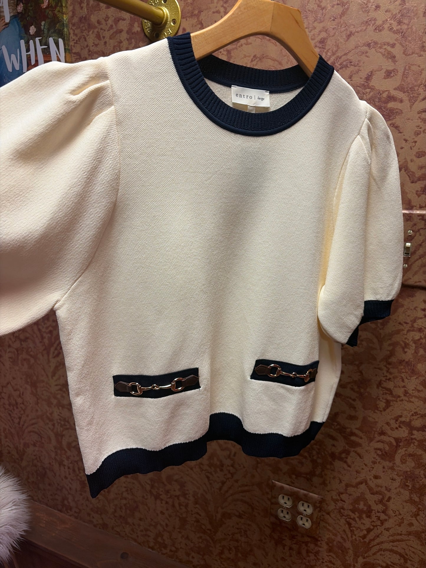 Entro equestrian sweater in cozy knit, featuring a classic design with ribbed cuffs and collar, perfect for riding or casual wear.