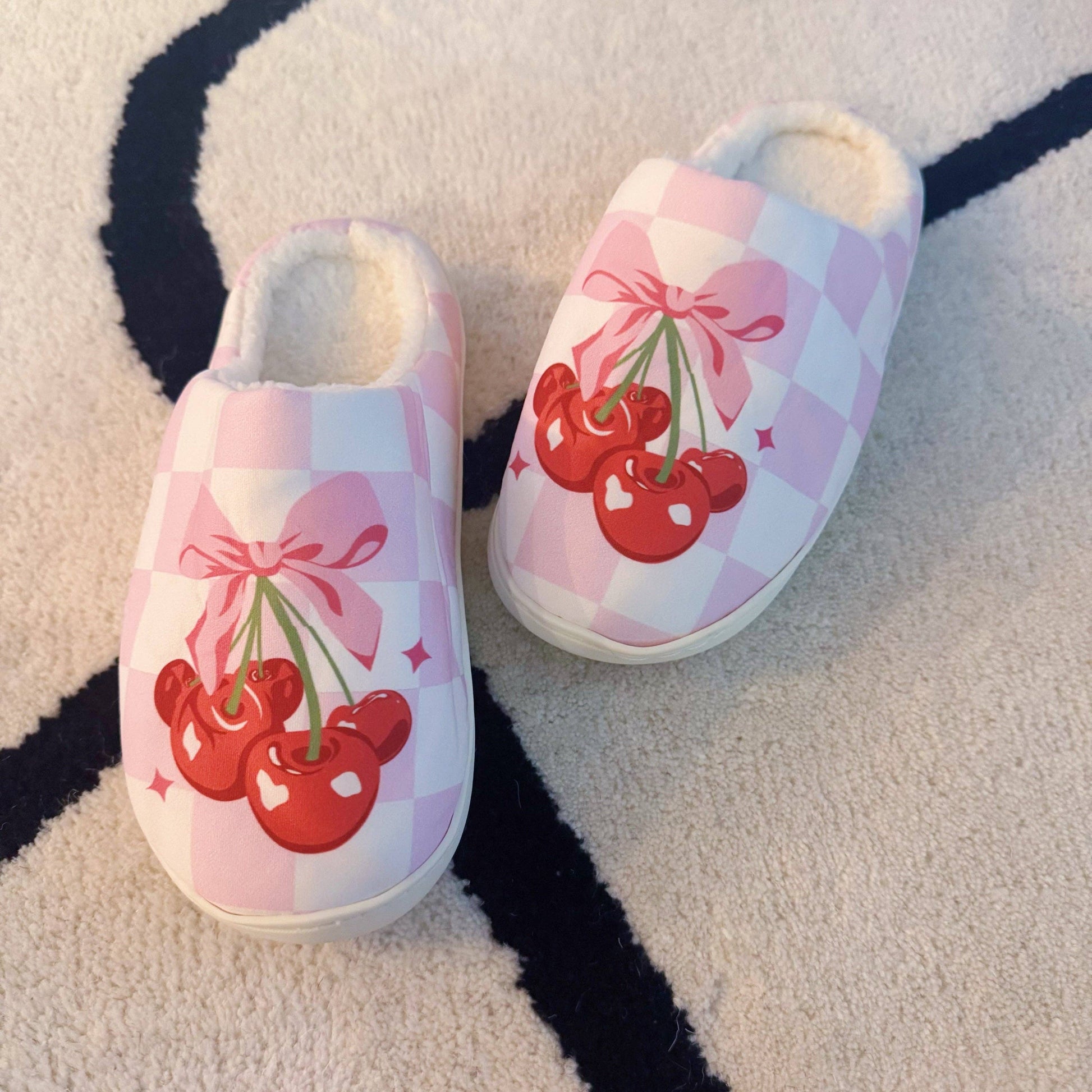 Ellison+Young Cherry Bow Check lounge slippers with cozy comfort and cute bow detail, perfect for relaxing at home.