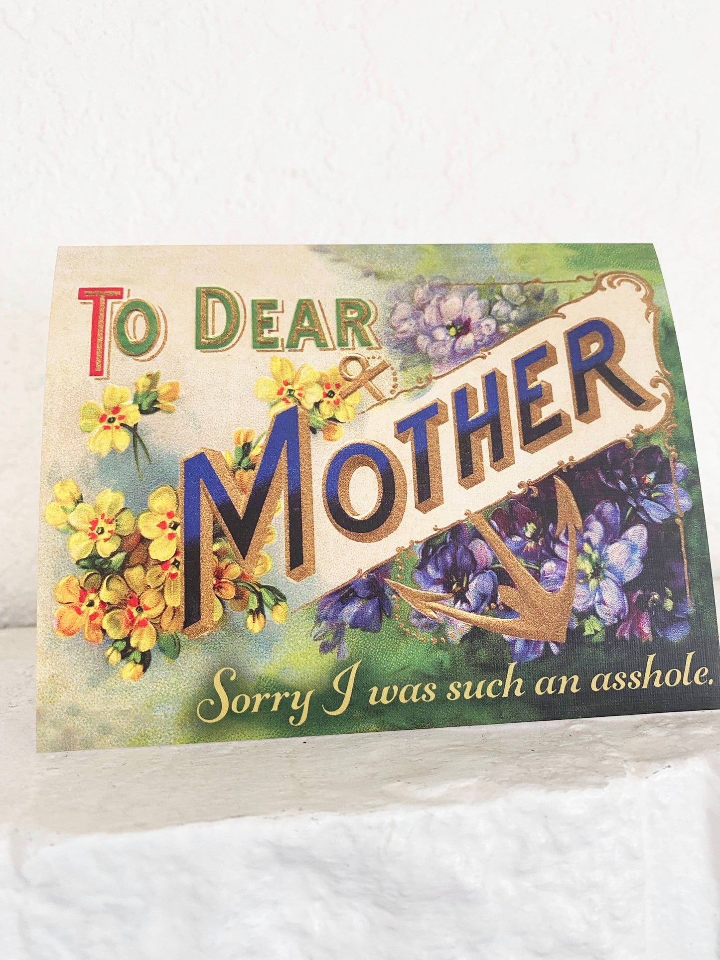 Funny greeting card from The Coin Laundry with humorous "Sorry I Was Such An Asshole" message, designed for heartfelt apologies.