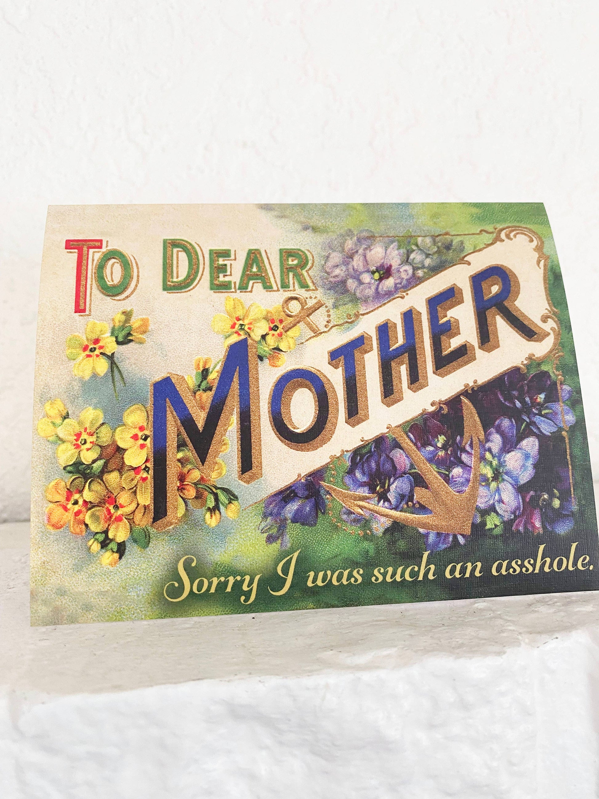 Funny greeting card from The Coin Laundry with humorous "Sorry I Was Such An Asshole" message, designed for heartfelt apologies.