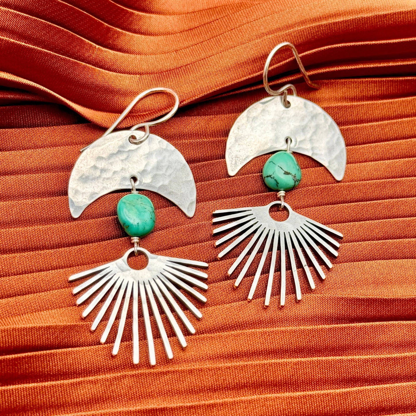 Fluff Hardware Solstice Earrings featuring modern, geometric design with silver-tone metal and intricate detailing.