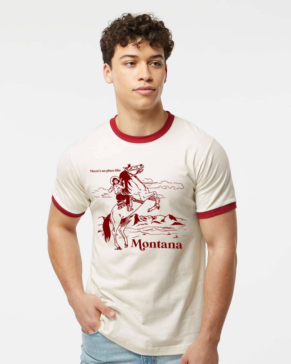Cream and red retro style ringer T-shirt with "No Place Like Montana" text from The Coin Laundry, featuring vintage-inspired design.