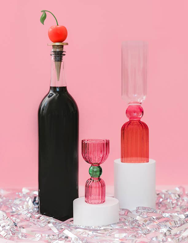Ban.do Tipsy Turvy Cherry wine bottle stopper with colorful cherry design, keeps wine fresh and adds a fun touch to your bottle.