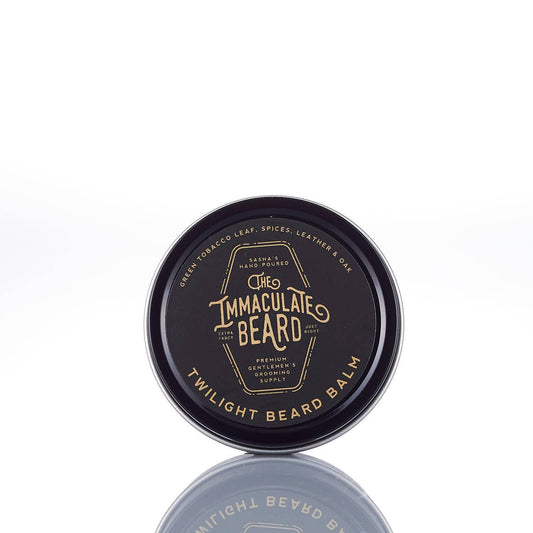 The Immaculate Beard Twilight Beard Oil bottle with dropper, showcasing a sleek design and dark amber color.