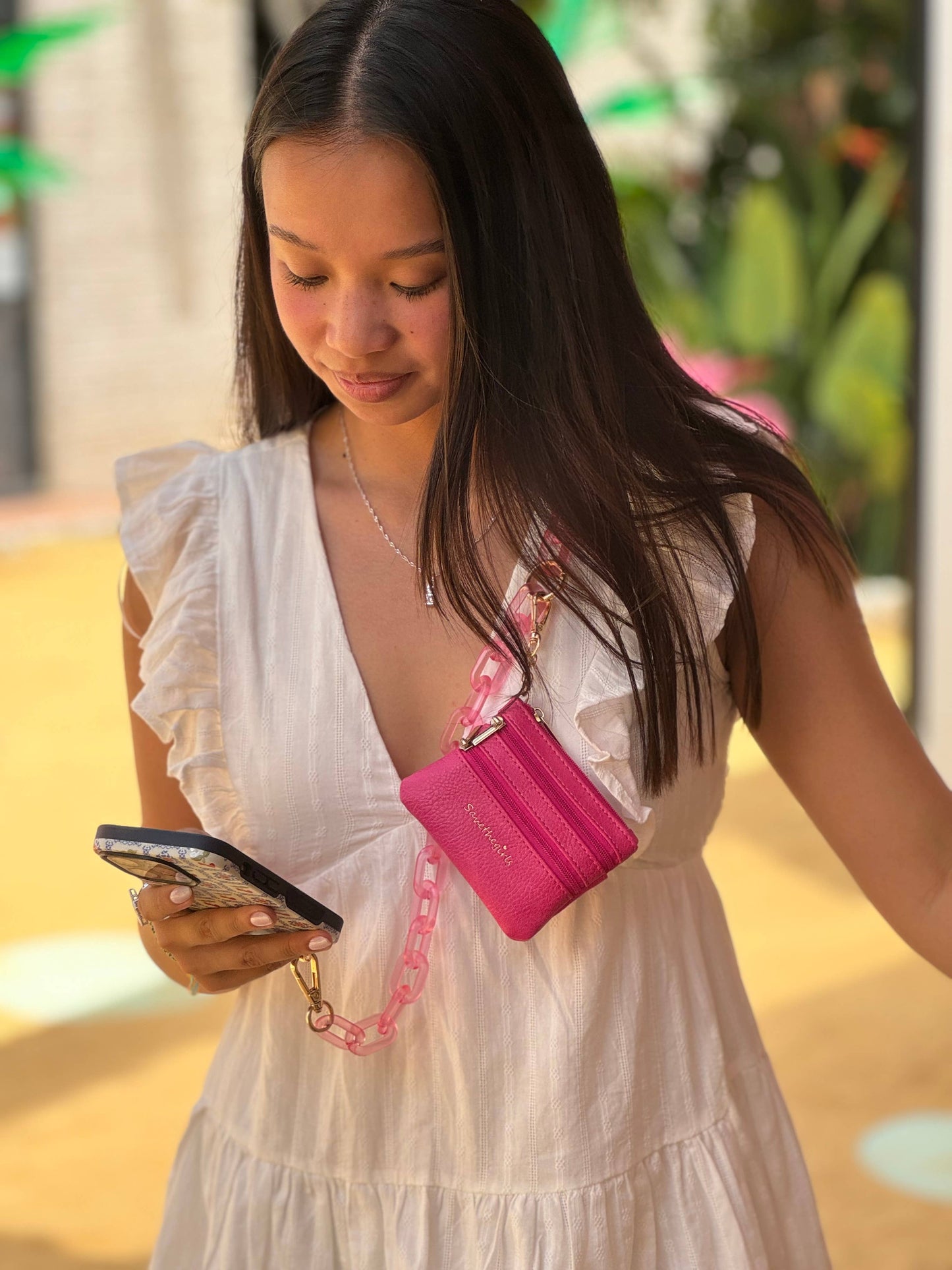 Save The Girls Clip & Go Ice Chain with Pouch for phones, featuring a durable chain and compact pouch for on-the-go use.