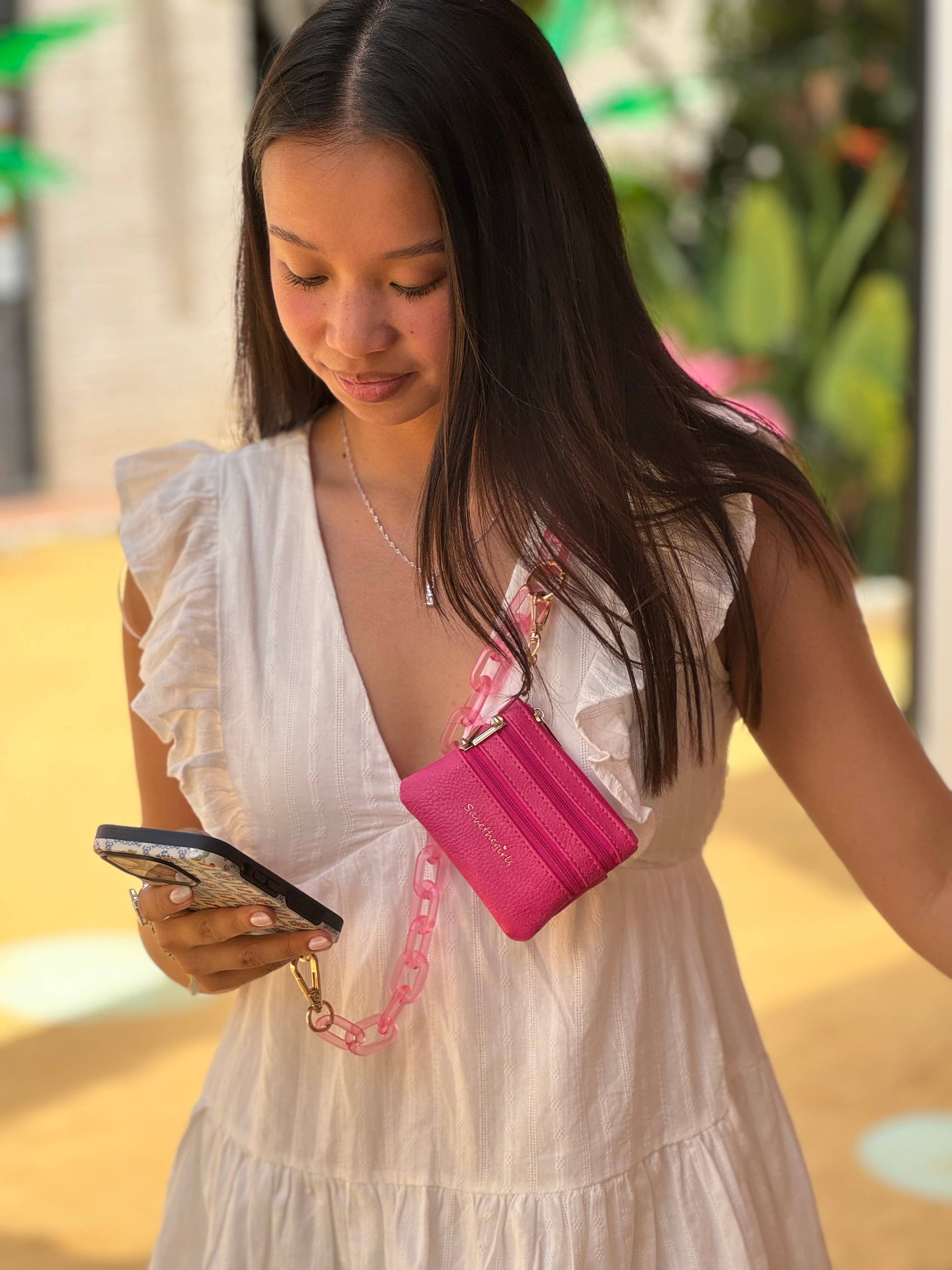 Save The Girls Clip & Go Ice Chain with Pouch for phones, featuring a durable chain and compact pouch for on-the-go use.