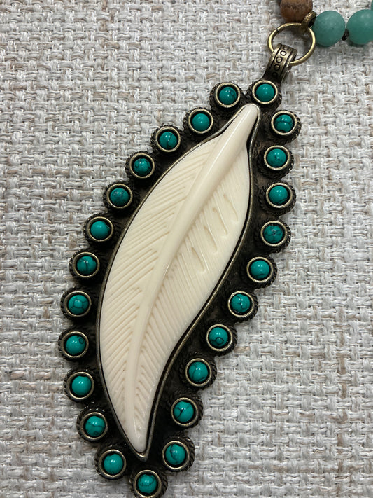 Beaded feather talisman necklace with colorful beads and feather charm, American Unique Group jewelry accessory