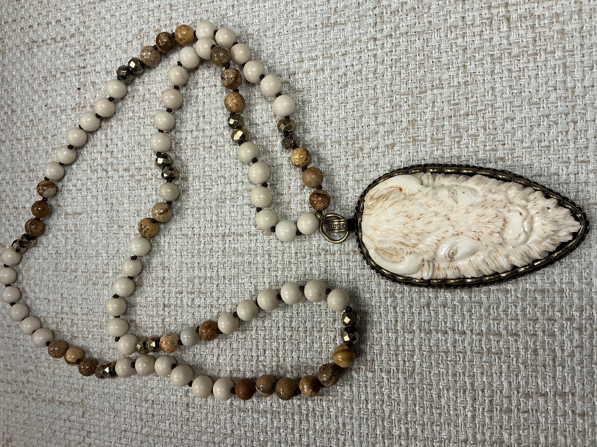 Beaded Buffalo Talisman Necklace with colorful beads and detailed buffalo pendant, crafted by American Unique Group.