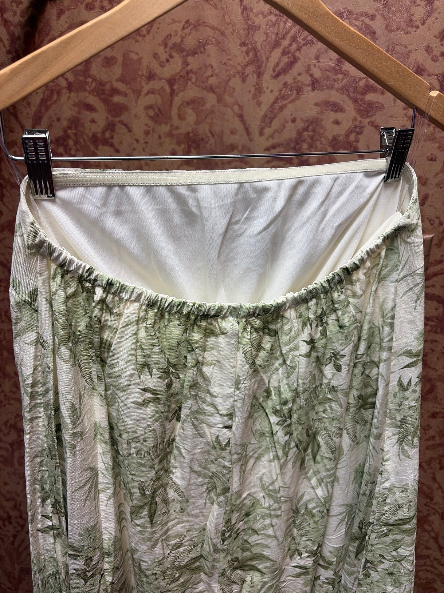 Princess & Buck Fern Gully Dress with floral pattern, sleeveless design, and flowing fabric for casual or summer wear.