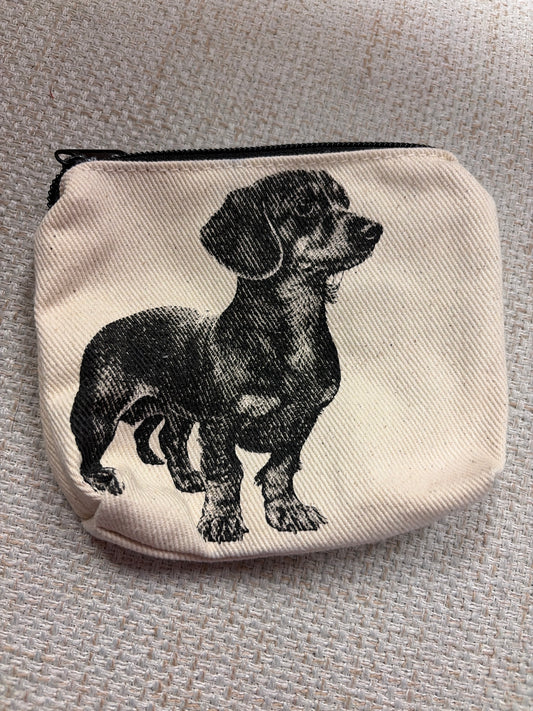 Canvas zip pouch from Rubyzaar featuring a compact bag with a zipper closure and natural fabric design.