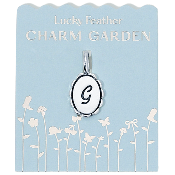Silver Charm Garden initial G charm with scalloped edges, designed by Lucky Feather, featuring intricate detailing.