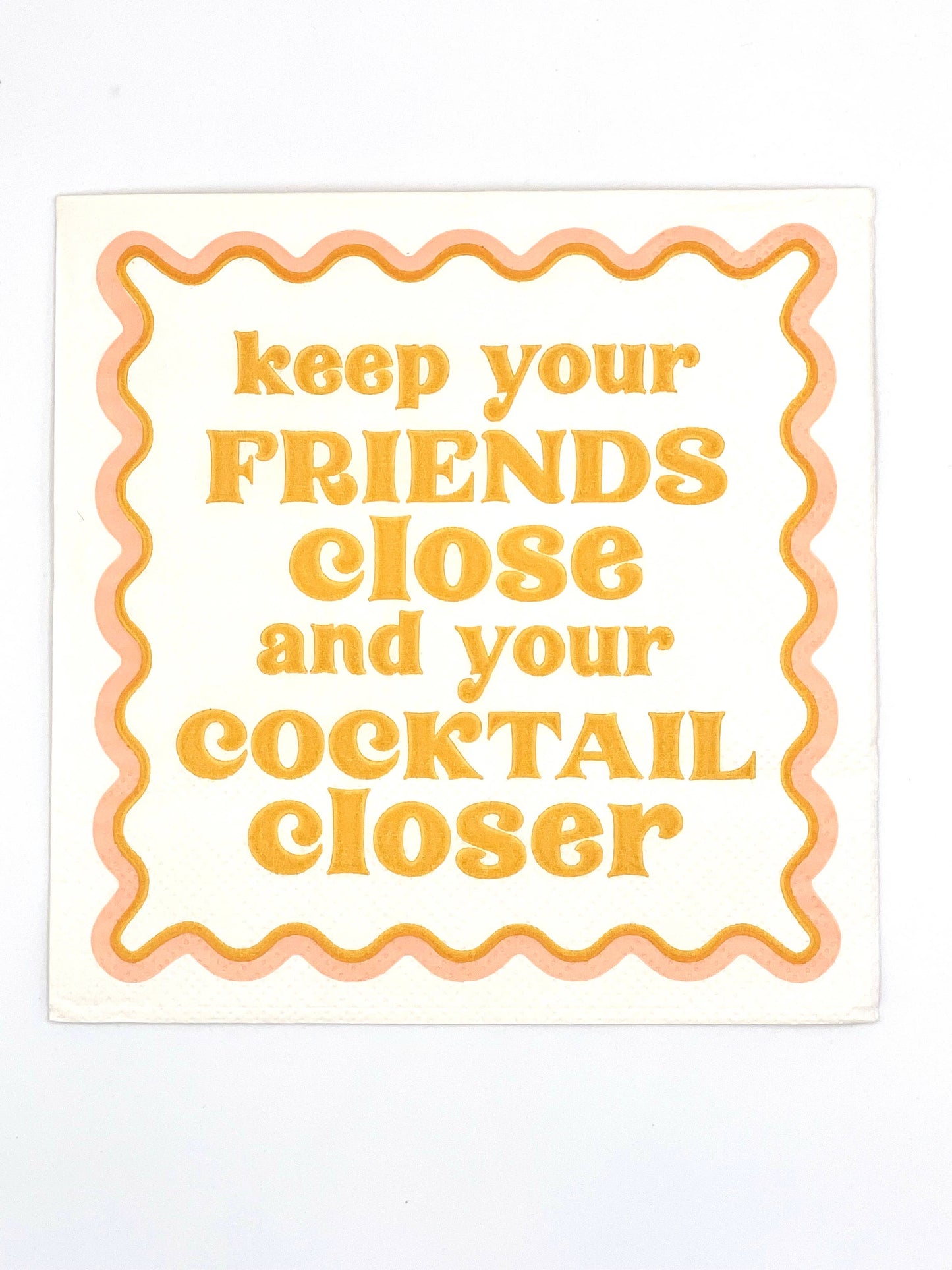 Set of 20 funny cocktail napkins by Soiree Sisters featuring humorous "Keep Your Friends Close" design for parties and gatherings.
