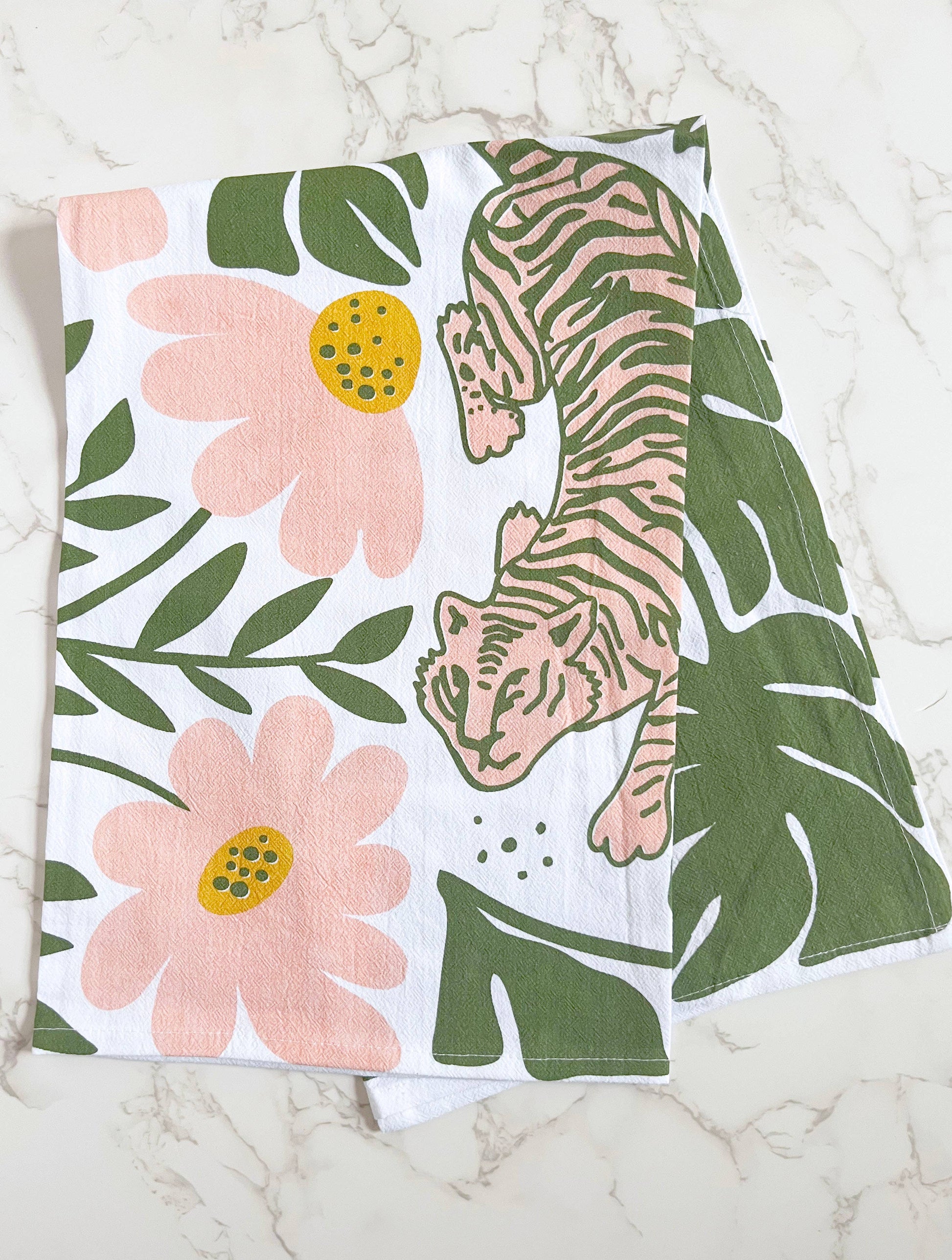 Tiger floral tea towel by The Coin Laundry featuring modern boho pink and green flower design for kitchen décor.