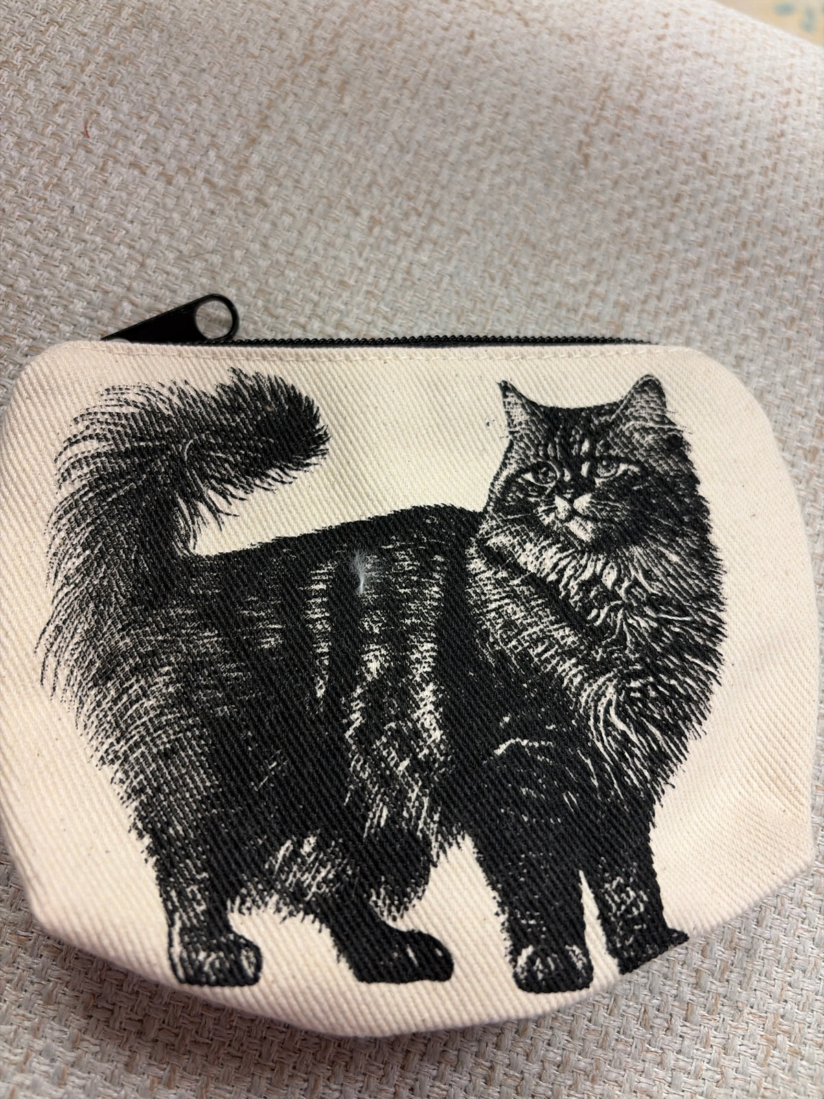 Rubyzaar canvas zip pouch with a compact, stylish design ideal for storing essentials in bags or purses.