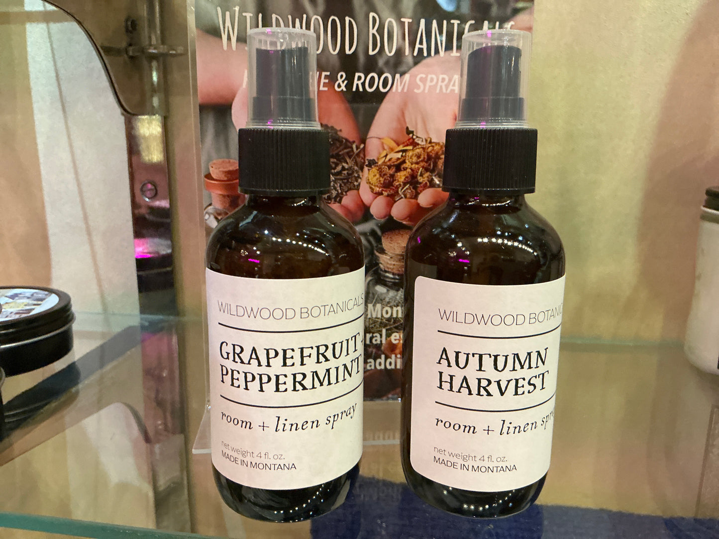 Wildwood Botanicals room and linen spray bottle with floral label, natural air freshener for home and fabric refreshment.