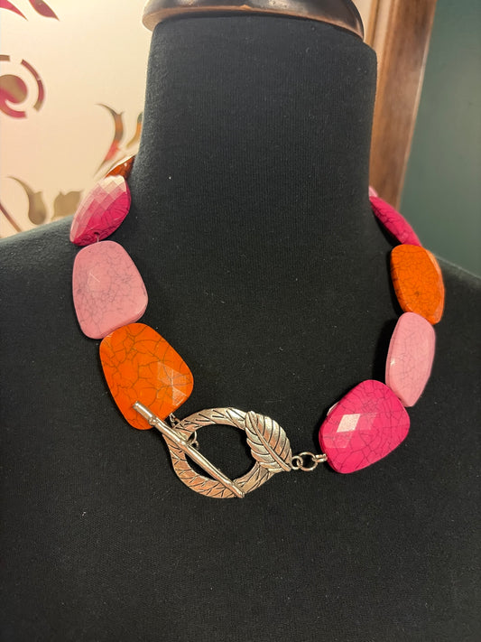 Pink and orange chunky necklace from Queen Gypsy featuring bold, vibrant beads and layered design for a statement accessory.