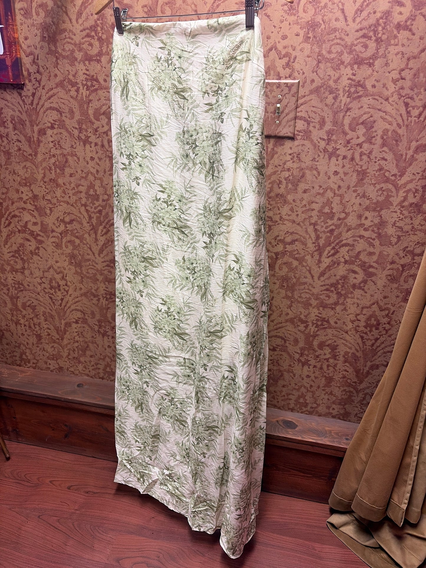 Princess & Buck Fern Gully Dress showing a flowy, floral-print dress with a cinched waist and lightweight fabric.