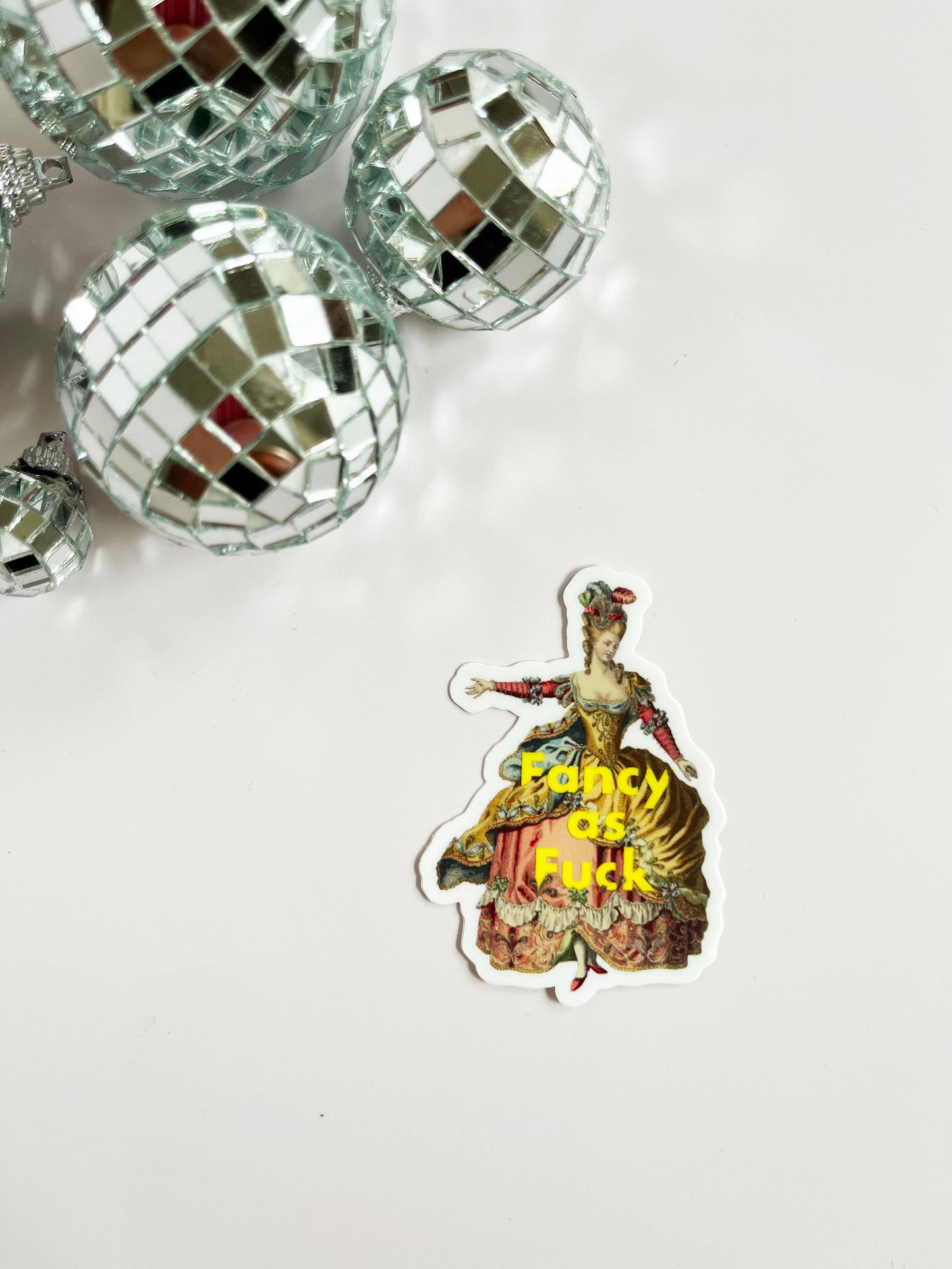 Funny "Fancy as F**k" sticker by The Coin Laundry, featuring bold lettering on a colorful background.
