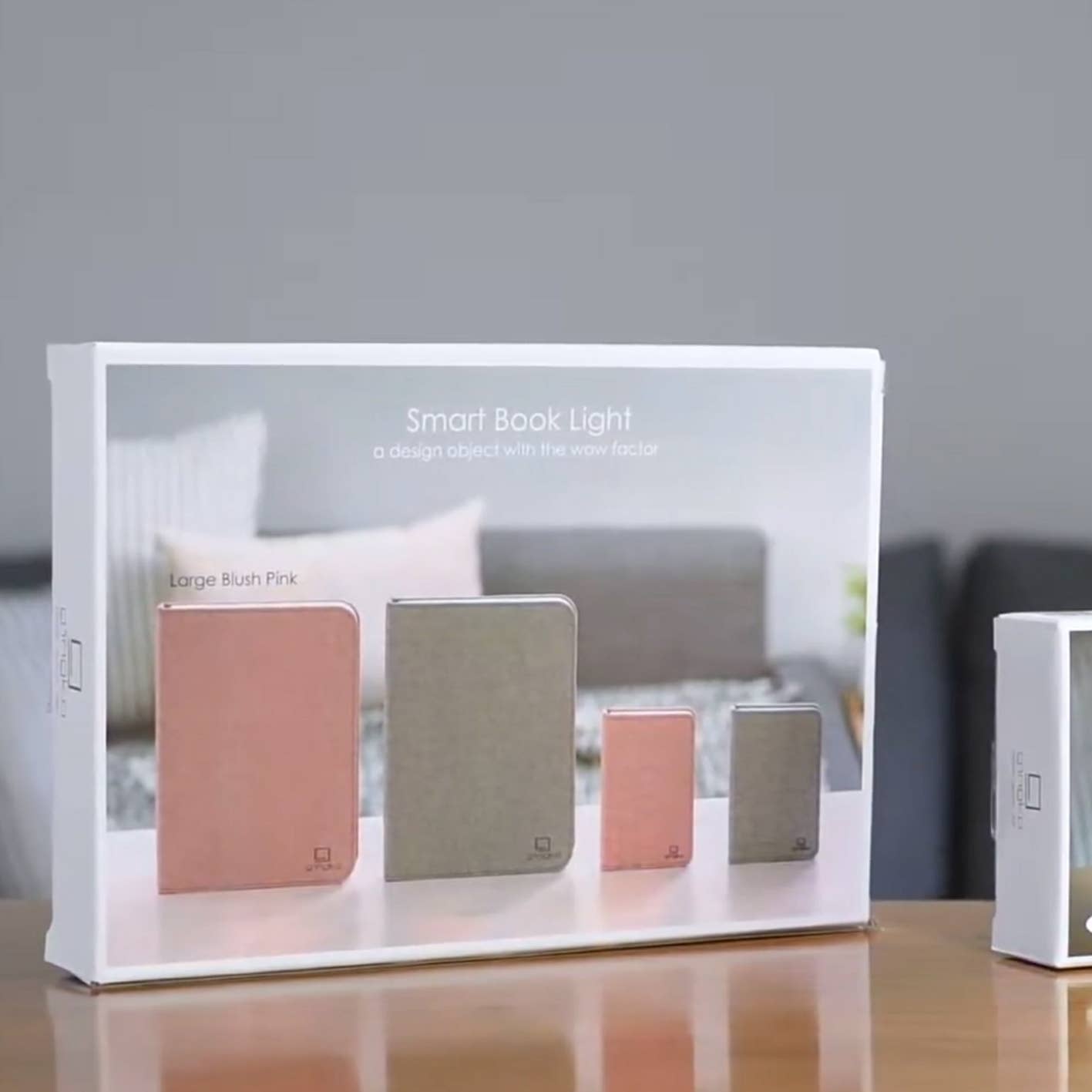 Gingko Design linen fabric smart book light with a sleek lamp design, perfect for reading and ambient lighting.