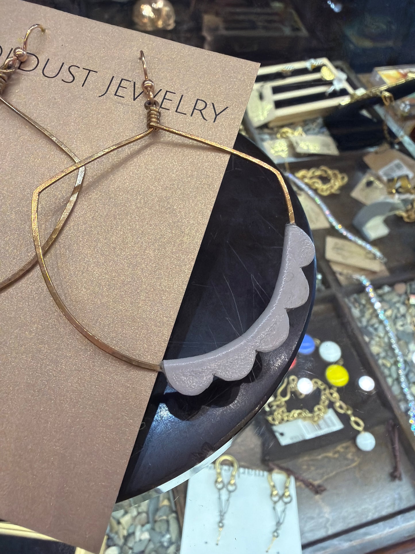 Goldust Jewelry GD Leather Earrings showing stylish leather drop earrings with gold accents on a white background