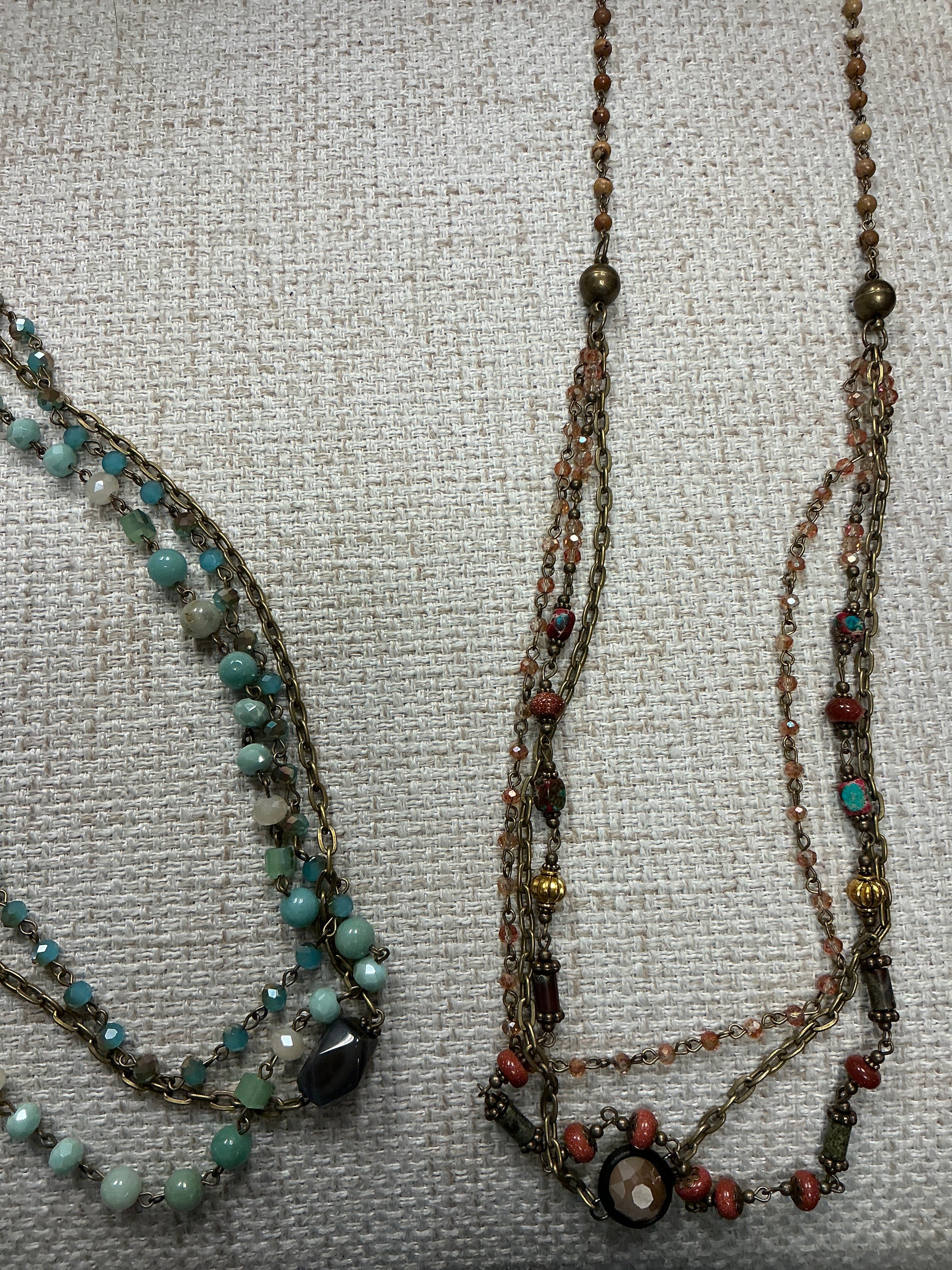 Beaded 2-in-1 necklace with colorful beads and layered design by American Unique Group, shown on a neutral background.