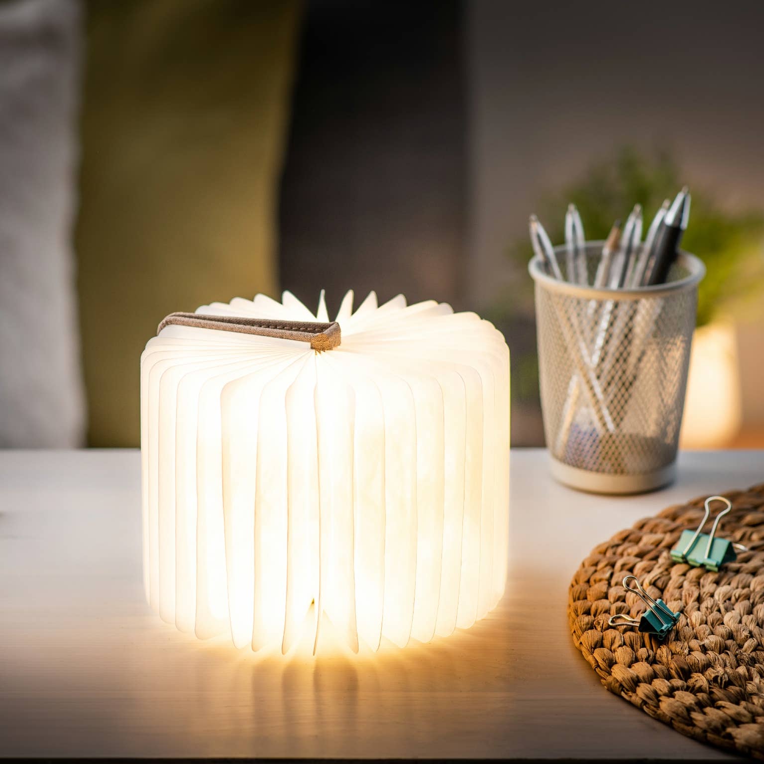 Gingko Design linen fabric smart book light lamp with soft illumination, featuring a sleek, minimalist design for reading and ambiance.