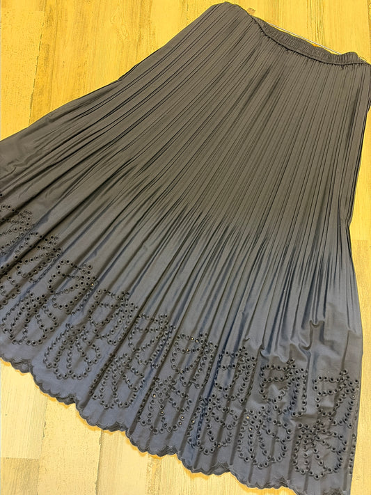 Navy eyelet maxi skirt from Current Air featuring flowing fabric and eyelet detailing, displayed on a neutral background.