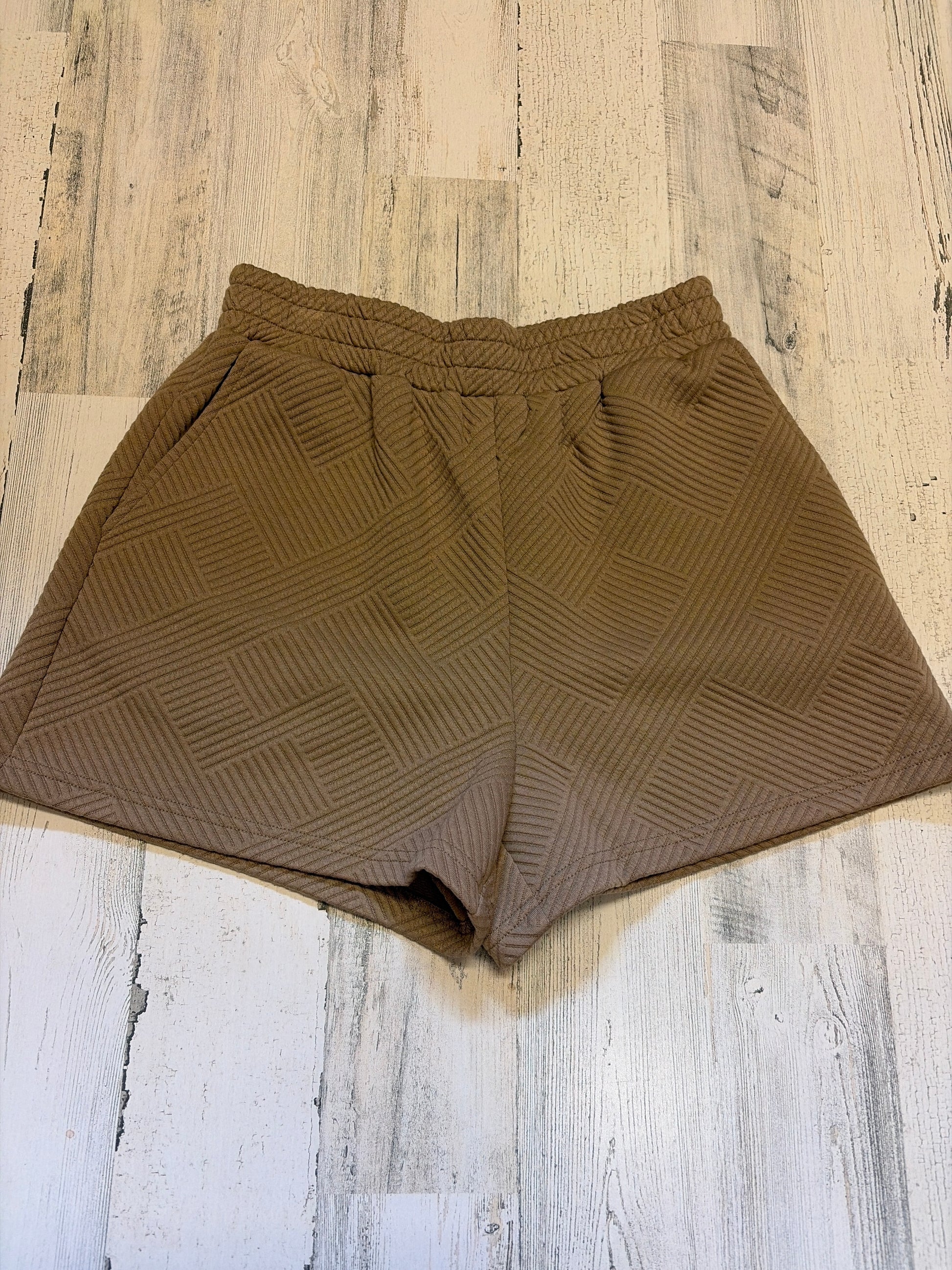 Textured zippered shorts by Miss B - Pixy & Ivy, featuring a stylish design and visible zipper details in a casual fit.