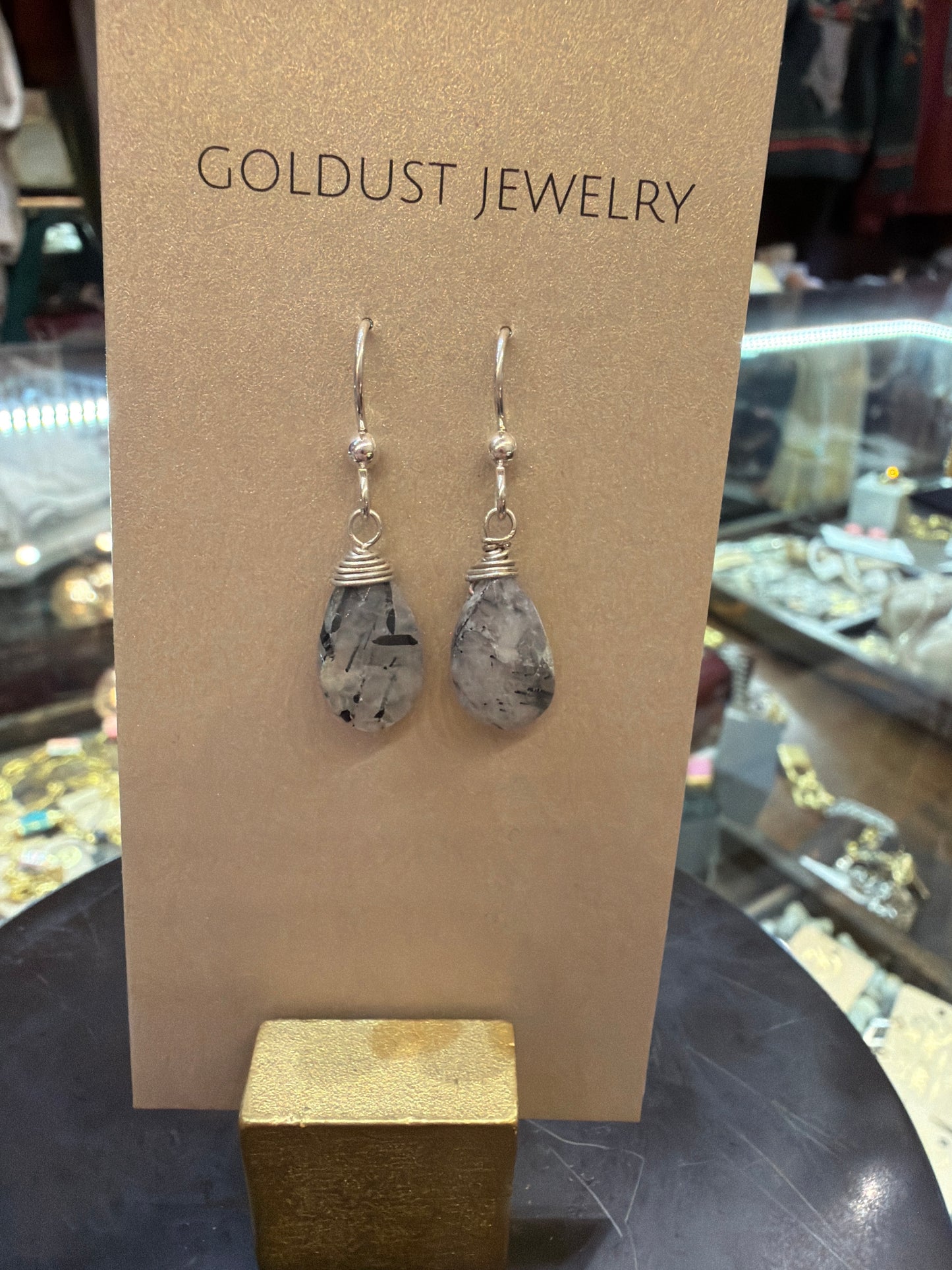 Goldust Jewelry GD semi-precious stone earrings featuring colorful stones set in elegant metal earrings.