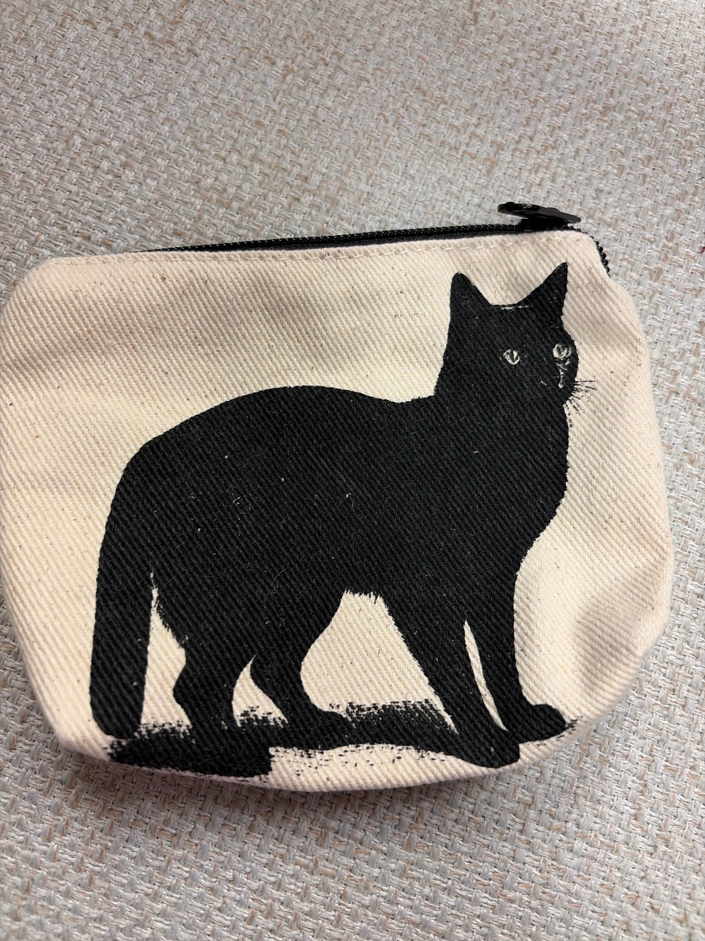 Rubyzaar canvas zip pouch bag with a sleek design, showcasing a compact and durable storage solution.