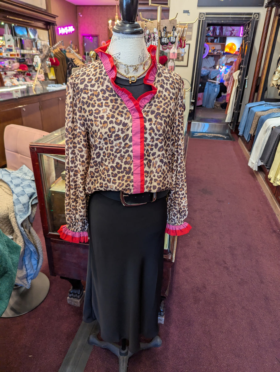 Pink Pinky Tuscadero blouse by BiBi, featuring a stylish, fitted top with vibrant pink fabric and detailed design.