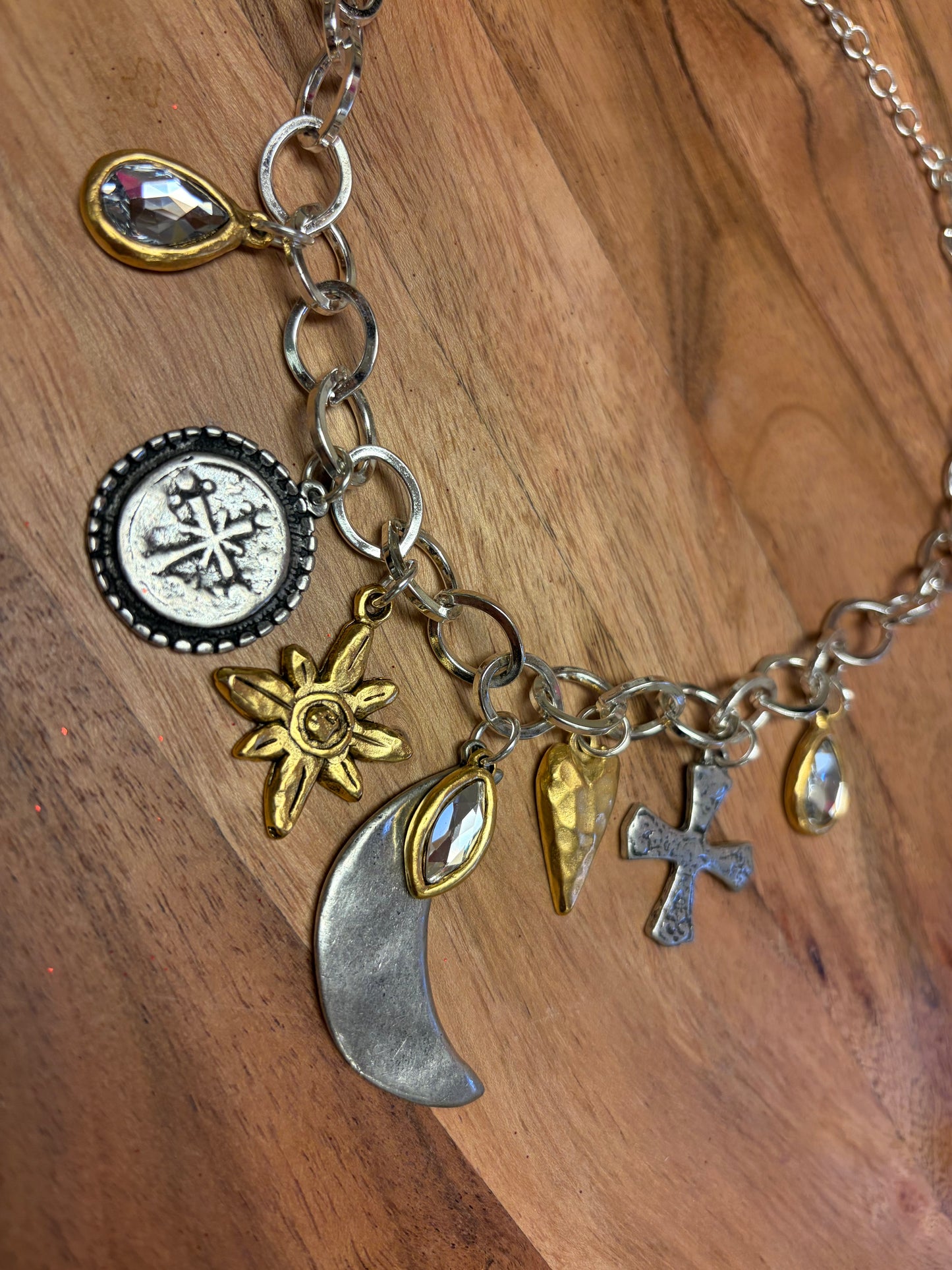 Lula 'n' Lee Charmed by the Moon necklace featuring a delicate moon pendant on a dainty chain.