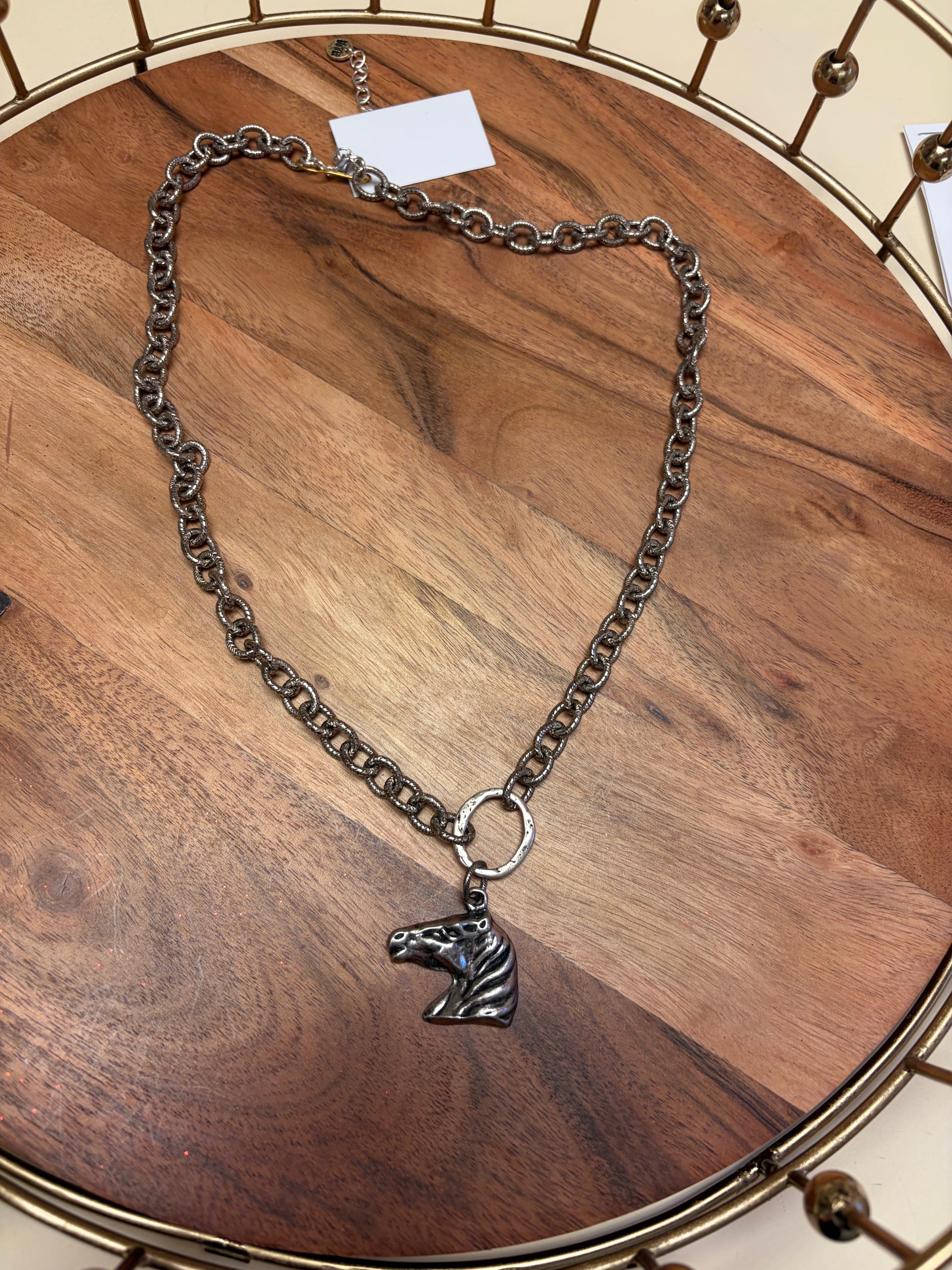 Lula 'n' Lee horsehead pendant necklace featuring a detailed horsehead charm on a silver chain.