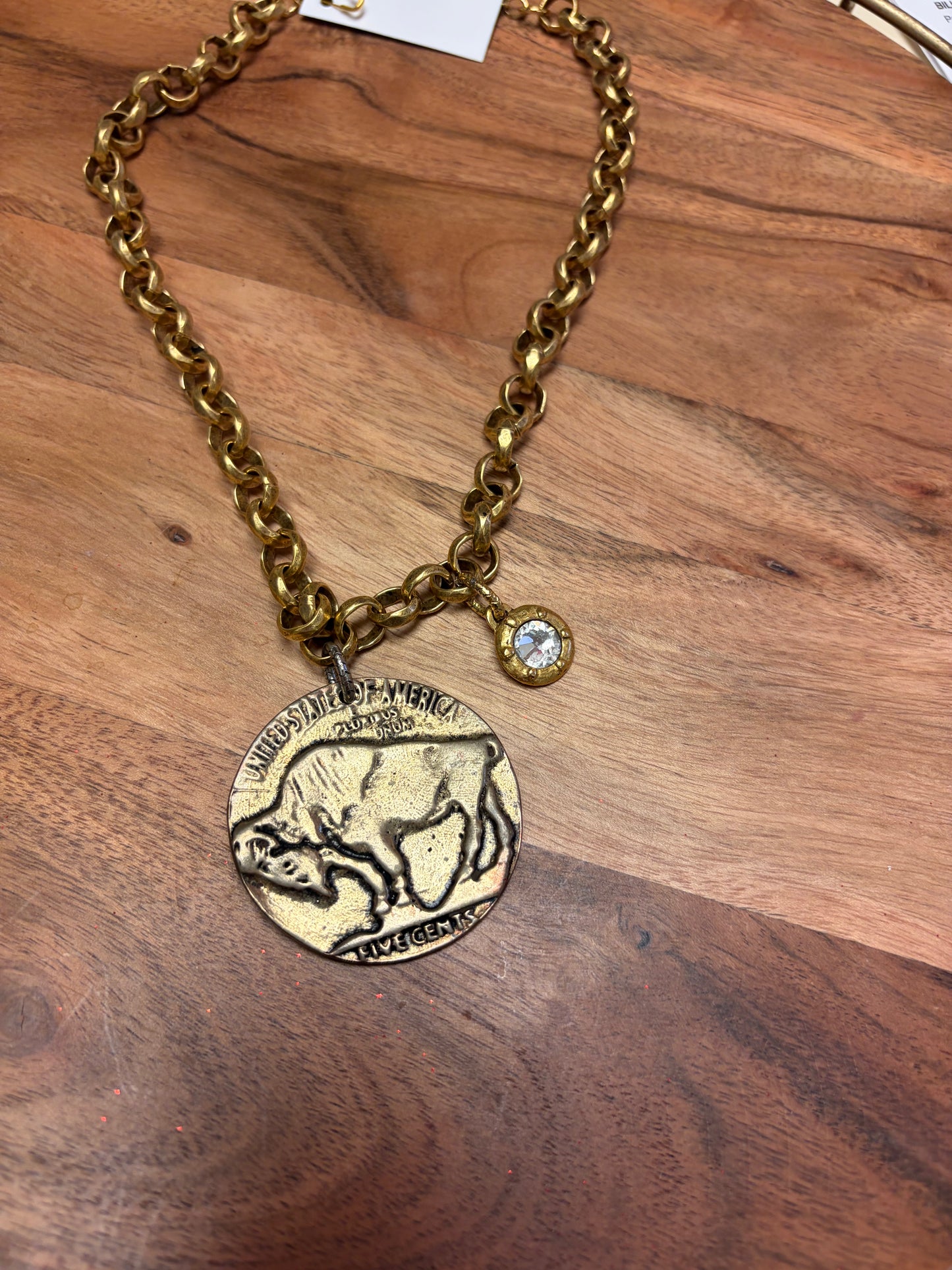 Buffalo coin and crystal necklace by Lula 'n' Lee featuring a silver chain with a coin pendant and sparkling crystal accents.